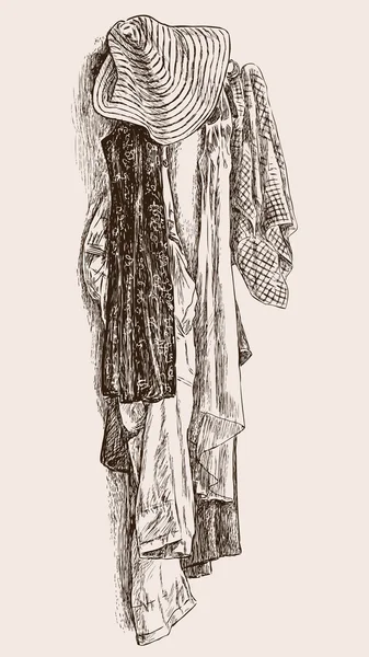 Одяг на вішалці — стоковий вектор