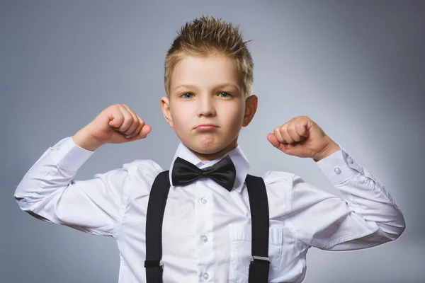 Closeup Portrait of Funny Little child. Sport Handsome Boy. Strong serious kid showing his hand biceps muscles — Stock Photo, Image
