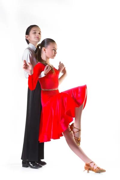 Boy and girl or beautiful couple in the active ballroom dance on white background — Stock Photo, Image