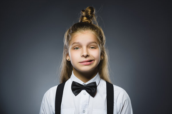 Offense girl isolated on gray background. Negative human emotion. Closeup