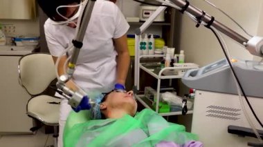 cosmetology, laser resurfacing, facial cleansing in the beauticians office, in a beauty salon.