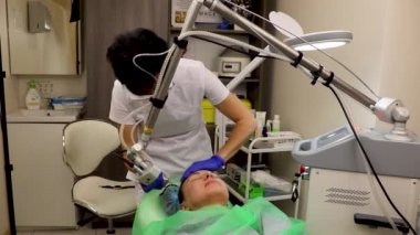 cosmetology, laser resurfacing, facial cleansing in the beauticians office, in a beauty salon.