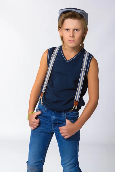 Cute blonde boy or teenager in half-length casual style blue jeans posing — Stock Photo, Image