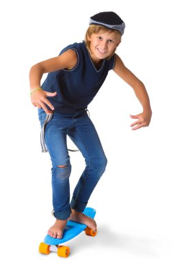 Sevimli sarışın çocuk veya genç tam uzunlukta rahat tarzı Mavi Jeans poz ve başparmak gösterilmesini beyaz izole