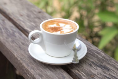 Bir fincan kahve Bahçe ahşap tablo