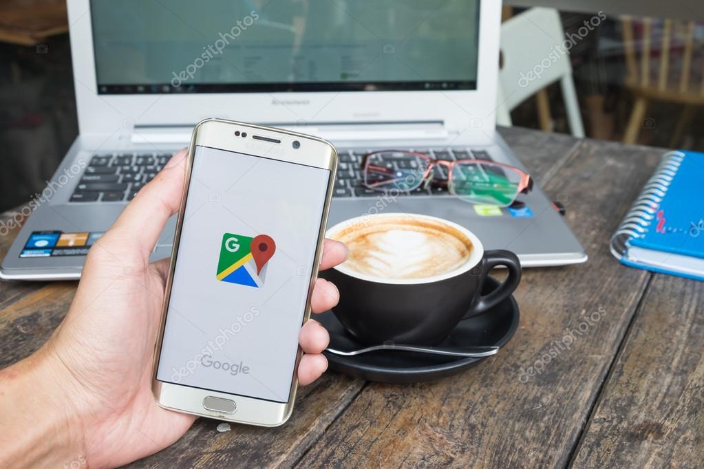 CHIANG MAI,THAILAND - MAR 9,2016 : Man holding a samsung galaxy s6 edge with Google app. Google Maps is a web mapping service application and technology provided by Google. Also available as a mobile app for smartphones.