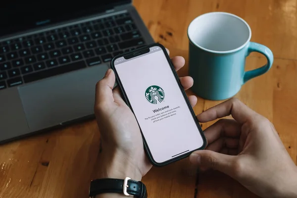 CHIANG MAI, THAILAND - JAN 23, 2021 : Starbucks app on the Apple iPhone display screen. opening online menu page of Starbucks website, Starbucks coffee shop. — Stock Photo, Image