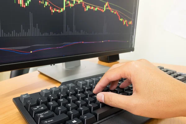 Close up trader's hand typing keyboard — Stock Photo, Image