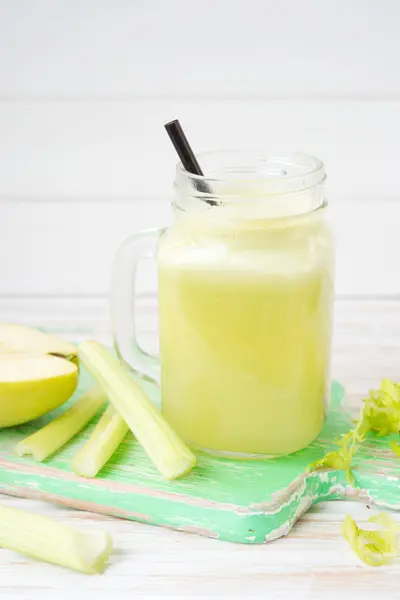 Freshly squeezed juice from a celery and apple