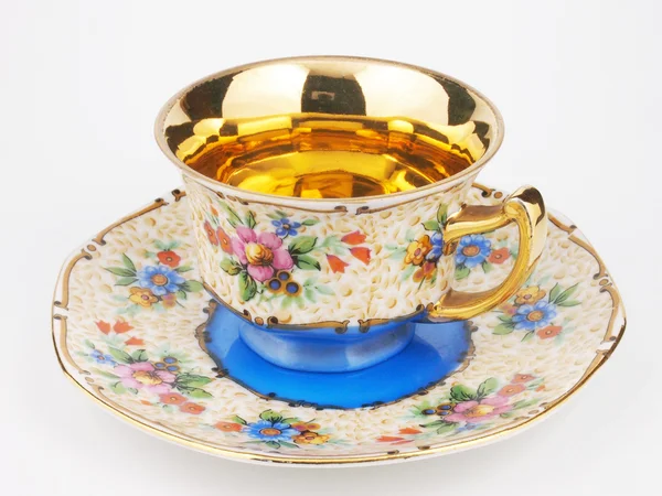 Antika porselen çay bardağı dekore edilmiş