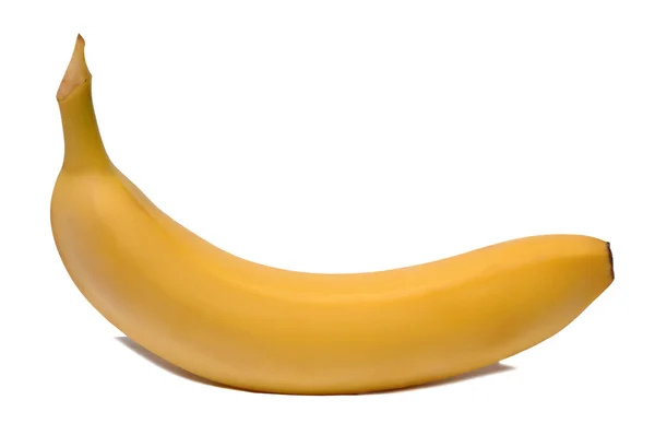 Желтый банан на белом фоне — стоковое фото