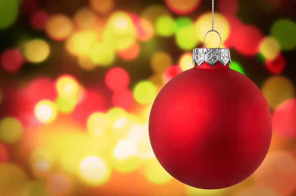 Bokeh arka plan üzerinde kırmızı Noel biblo