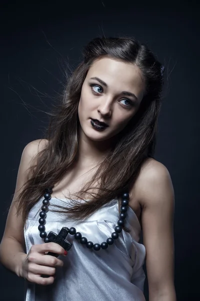 Young attractive nun with black lips Stock Image