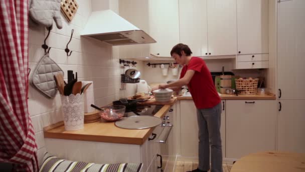 Teenager Boy Using Rack for Drying Green — Stock Video