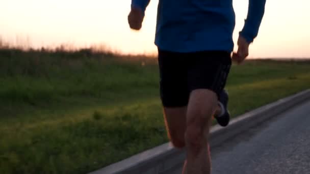 A sportolók test egy futó közeli, miközben Jogging — Stock videók