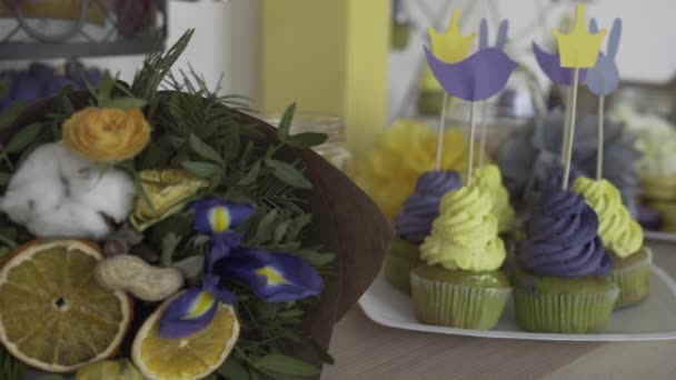 Holiday table with treats and beautiful bouquet — Stock Video