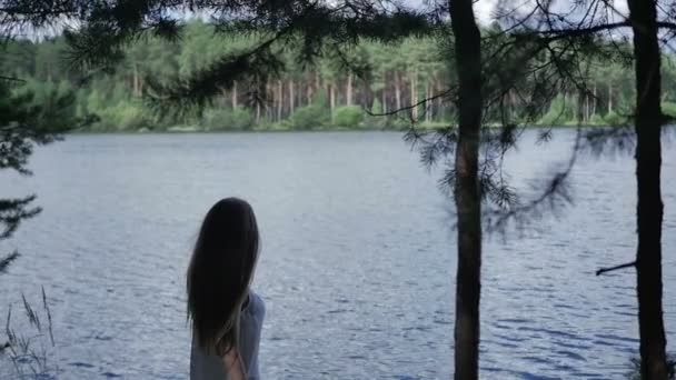Girl near the river — Stock Video