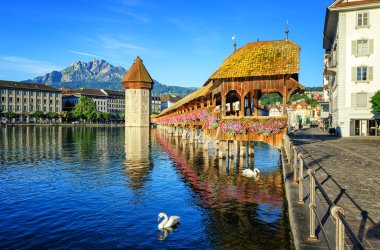 Wooden Chapel Bridge and Water Tower int Lucerne, Switzerland clipart