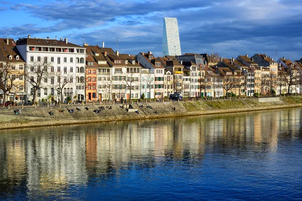 Houses along the Rhine river with Roche Tower in background, Basel, Switzerland — Stok fotoğraf