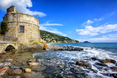 Historical Saracen tower in Alassio, resort town on Riviera, Italy clipart