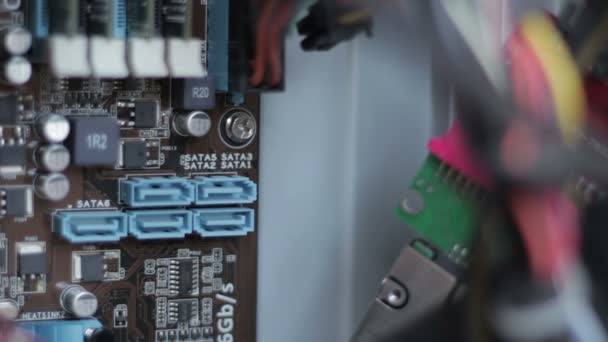 Connecting SATA cable to the Motherboard — Stock Video