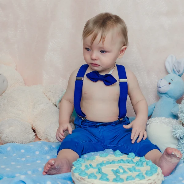 Little boy crying at her 1st birthday party