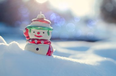 Kış konsepti ile kar arka plan kardan adam.