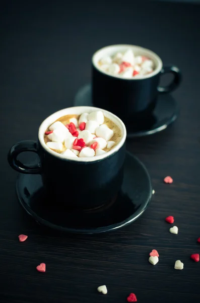 Coffee with marshmallow and small hearts. — Stock Photo, Image