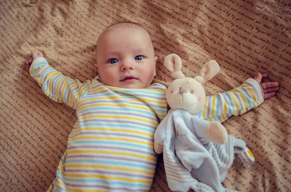 Sweet baby with a toy — Stock Photo, Image