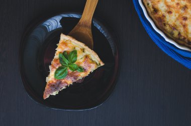 Piece of French quiche Lorraine pie