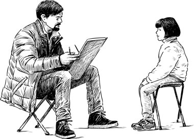 sanatçı bir portre yapar