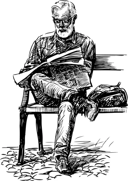 yaşlı adam bir gazete okuyor