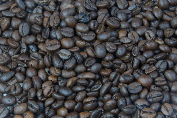 Grãos de café marrom textura de fundo. Fotos De Bancos De Imagens