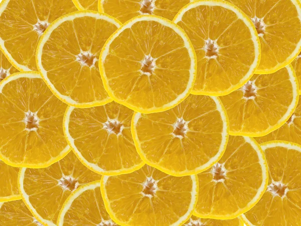 Heap of orange slices on a white background