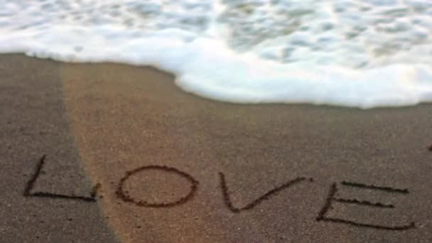 Die Inschrift im Sand - Liebe — Stockvideo