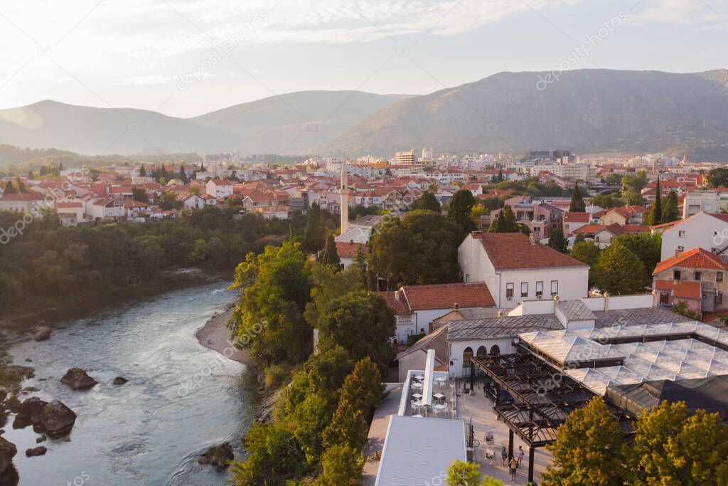 Beautiful view of the river Neretva in the city of Mostar at sunset. Bosnia and Herzegovina