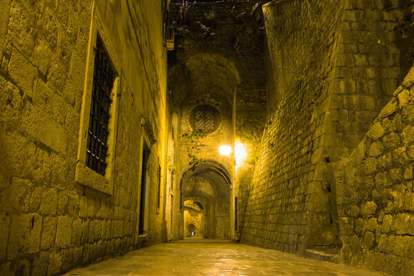 Narrow street in the Old Town of Kotor at night. Montenegro