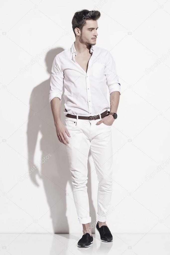 Handsome man elegantly dressed in white