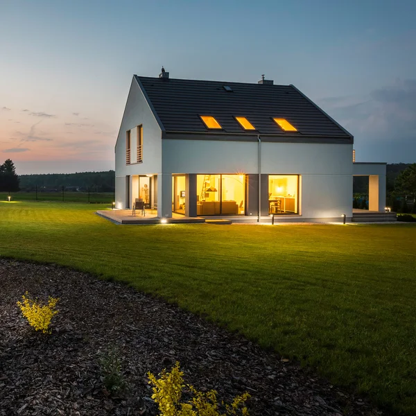 Stylish and modern house at night — Stock Photo, Image