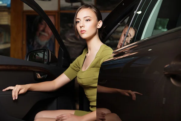 Girl sitting in the car — Stock Photo, Image