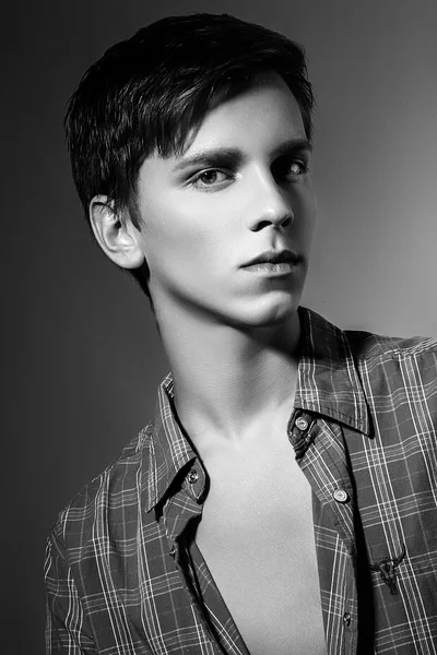 Studio photo of young  man on gray background — Stock Photo, Image