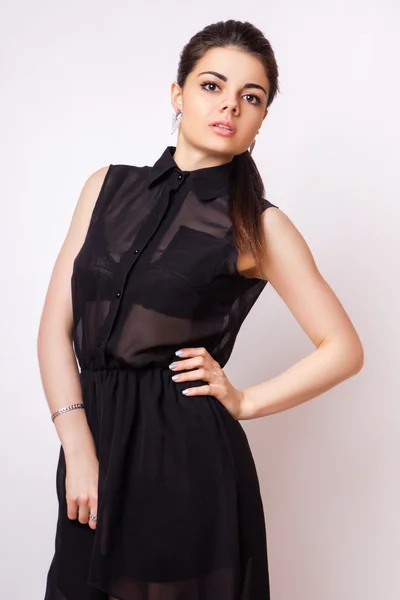 Fashion style studio photo of a cute brunette, isolated on white background — Stock Photo, Image