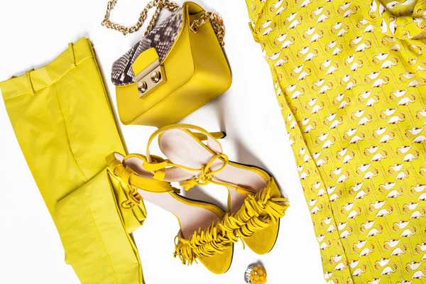 Women's yellow dress, shoes with heels and accessories. Stylish set for fashionista. — Stock Photo, Image
