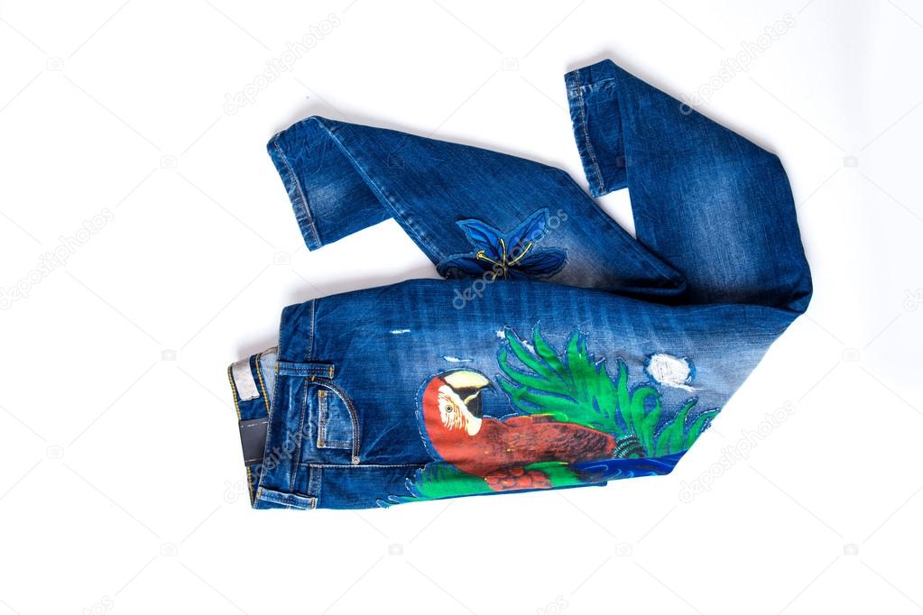 Blue jeans with print of a parrot isolated on white — Stock Photo