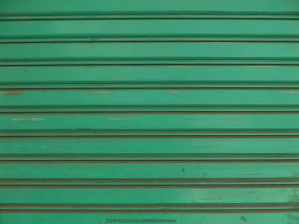 Avvolgibile porta verde scuro — Foto Stock