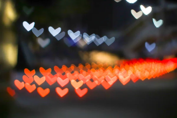Оранжевый Боке Размытие Формы Сердца Любовь Валентина Красочный Ночной Свет — стоковое фото