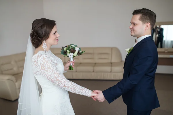 Holding hands newlyweds — Stock Photo, Image