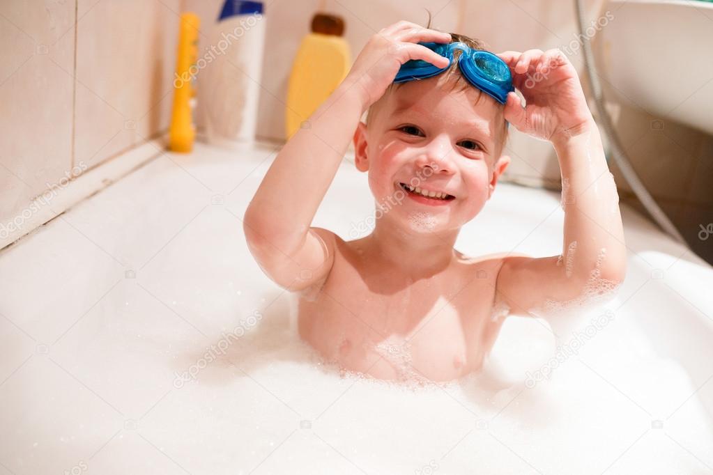 A boy swims in the bathtub Stock Photo by ©familylifestyle 91174496