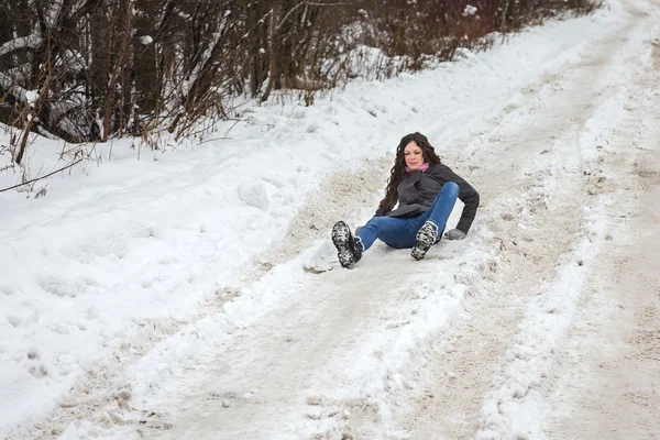 A young girl slipped and fell. Stock Picture