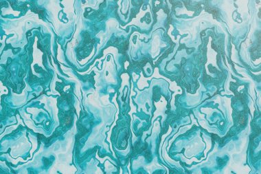 Bu canlı soyut arka plan, mavi-yeşil tonlarında büyüleyici bir girdap deseni içeriyor, mermerin veya akışkan sıvının organik güzelliğini çağrıştırıyor..